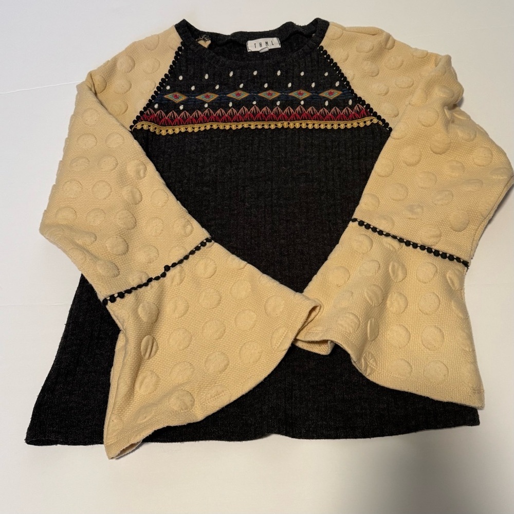 T H M L sweater
